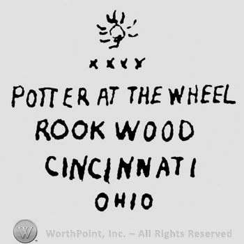 Pottery at the wheel Rookwood Cincinnati Ohio written below a symbol