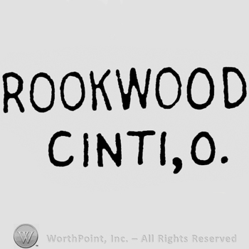 Written on 2 lines: Rookwood Cinti, O.