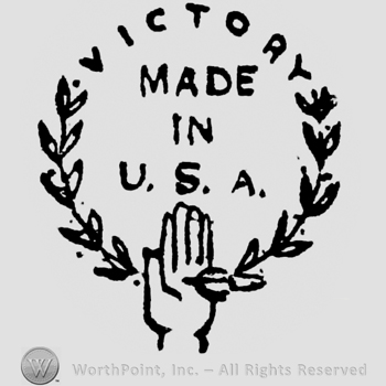 Victory written on top, Made in U.S.A. written under in a semi circle of laurels outspreded by a hand