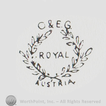 Branches round logo with "O & E G written above, Royal in the center and Austria written below with uppercase letters