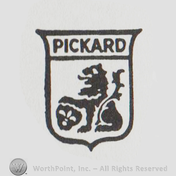 a shield with a lion holding fleur-de-lis, Pickard written with uppercase letters