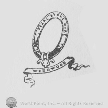 an oval shape with fleur de lis at the bottom and a ribbon below with Wedgwood in uppercase letters
