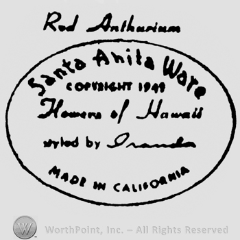 Red Anthurium written on top. Santa Anita Ware written above, Flowers of Hawaii written in the middle, Made in California written below, inside an oval