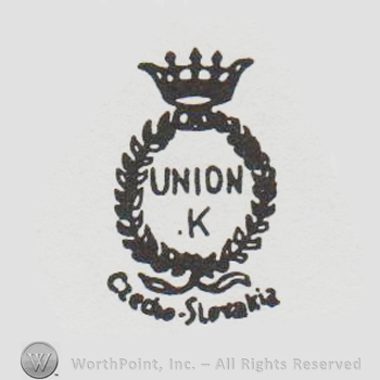 a crown above two branches with "union K" written inside in uppercase letters, Czecho-Slovakia written below with lowercase letters 