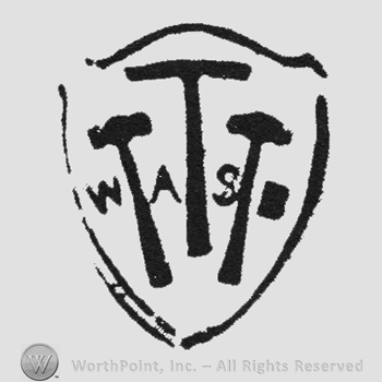 Tools with initials WASB between them all inside a shield