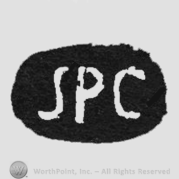 White initials JPC inside a black oval