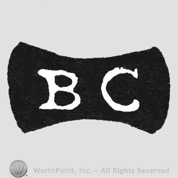Black label with white initials inside BC