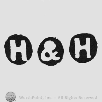 White initials H&H each inside a black circle
