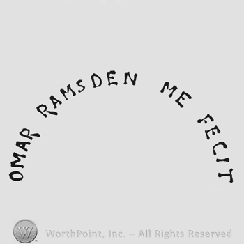 Curved capital writing Omar Ramsden Me Fecit