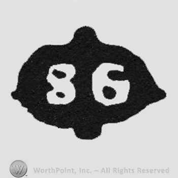 White number 86 inside a black shape