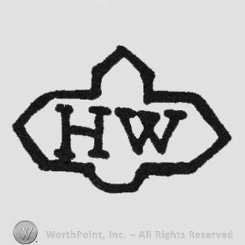 Monogram of letters HW inside a cross