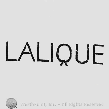 Capital writing Lalique