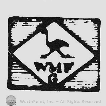 Bird and writing WMF inside diamond inside square