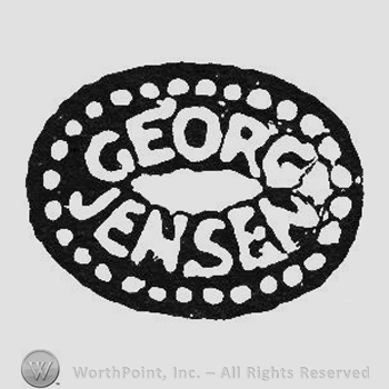 Curved capital white writing Georg up Jensen under all inside a black oval