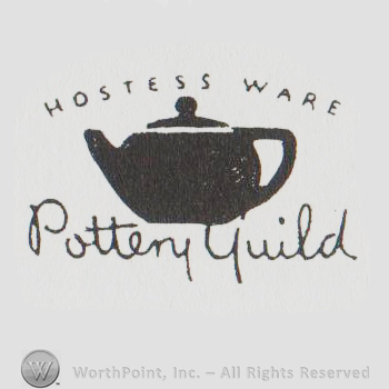 a black teapot, Hostess Ware written above with uppercase letters, Pottery Guild handwritten below