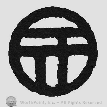 Monogrm of letters TT inside a circle