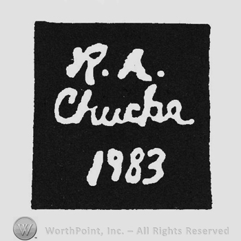 White handwriting RA Chucka 1983 inside a black square