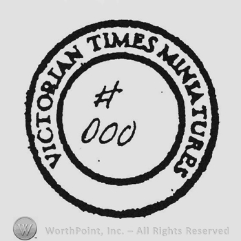 # 000 inside double circle Victorian Times Miniatures writen between circles
