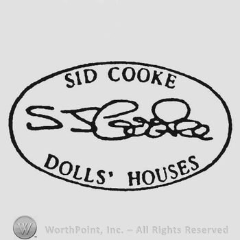 Curved capital writing Sid Cooke up Dolls Houses down signature middleall inside oval