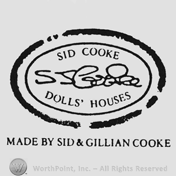 Curved capital writing Sid Cooke up Dolls Houses down signature middleall inside double oval