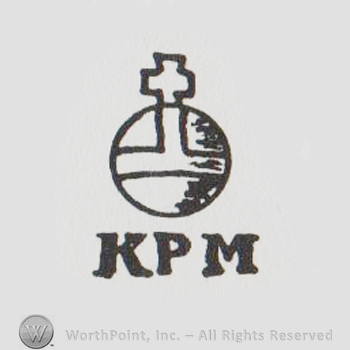 round logo with a cross and KPM