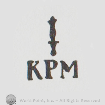a scepter above "KPM"