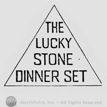 The Lucky Stone Dinner Set written in a triangle shape frame