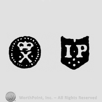 X crowned and IP, pellet between, four pellets below