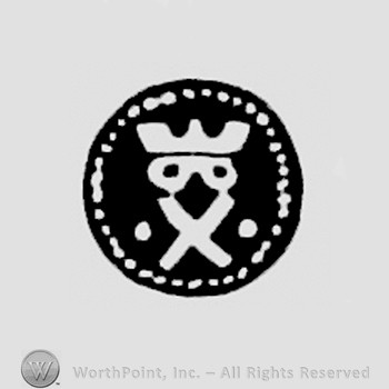 X crowned between pellets in dotted circle