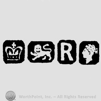 Crown and Lion Passant and date-letter R and Man's Profile