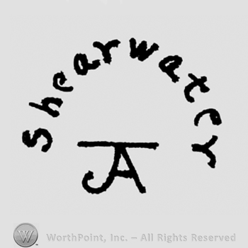 Shearwater written arched above Ja monogram